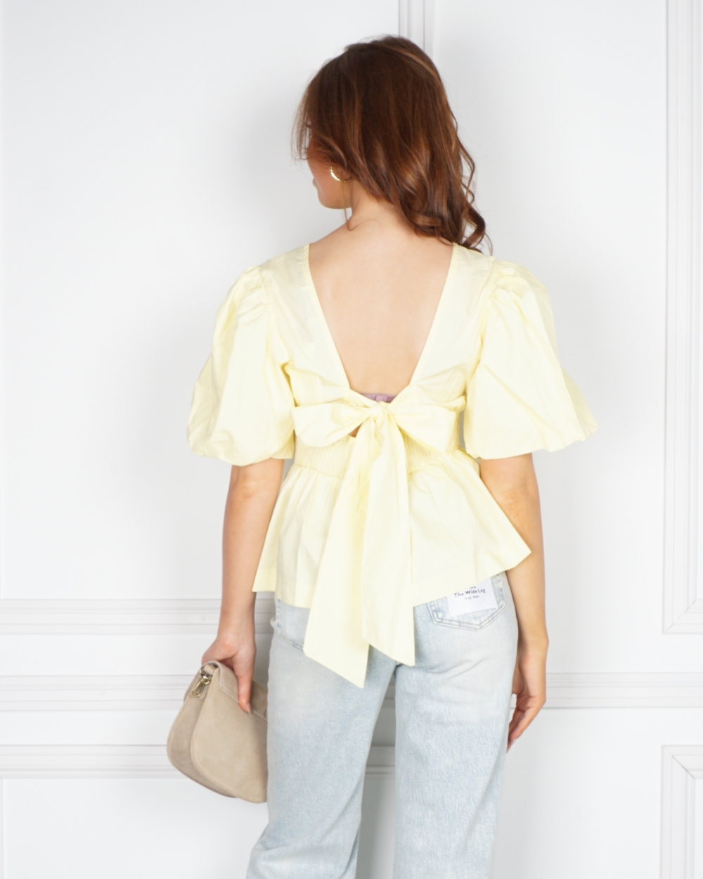 BLOUSE MET BALLONMOUW EN STRIK GEEL