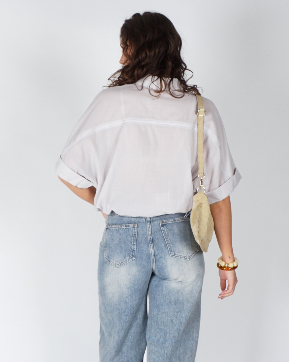BLOUSE MET WIJDE MOUWEN EN GEVLOCHTEN DETAILS GRIJS