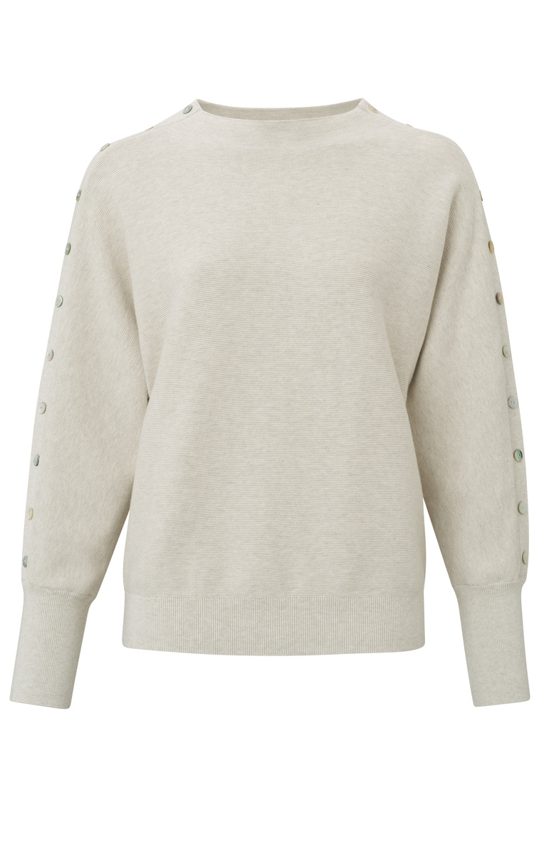 TRUI MET KNOOPDETAILS OP DE MOUW