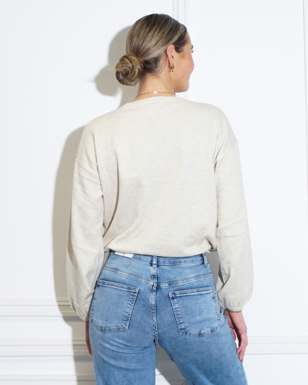 TRUI MET TREKKOORD BEIGE