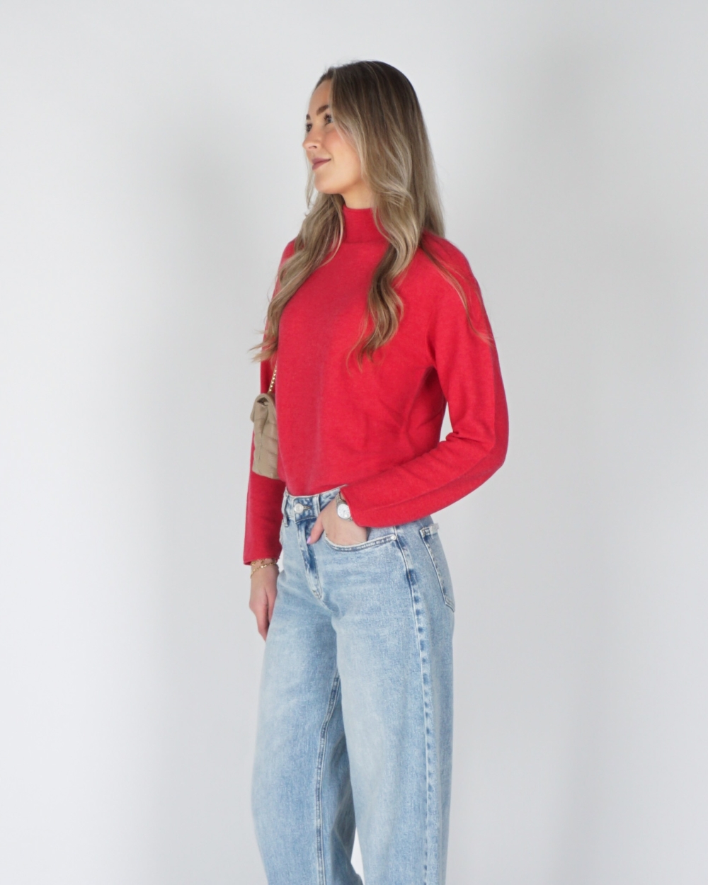 GEBREIDE TRUI MET KNOOPJES ROZE