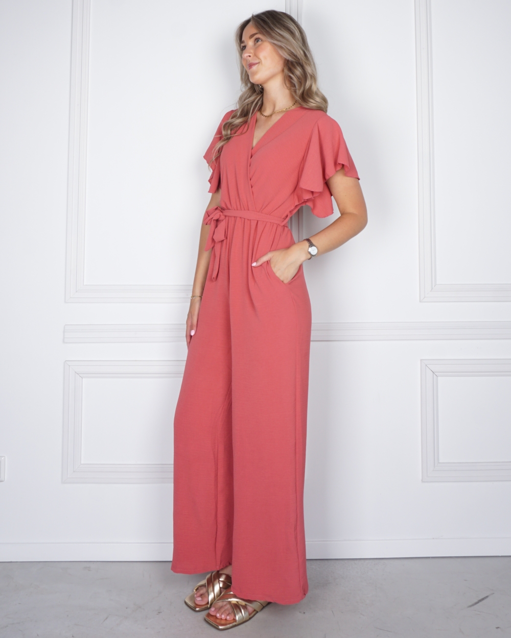 JUMPSUIT MET RUFFLE MOUW ROZE