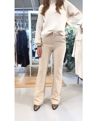 BEIGE FLARED BROEK MET STEEKZAKKEN