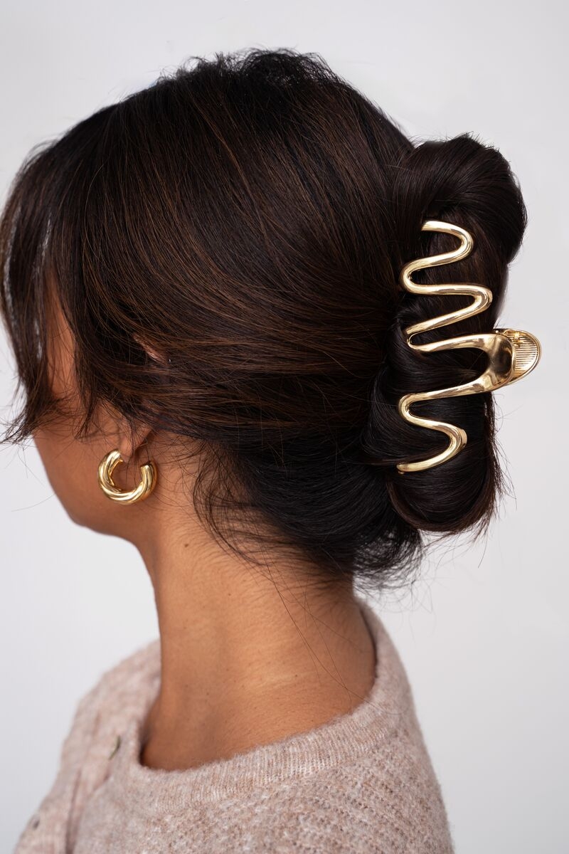 HAARCLIP MET TWIST GOUD