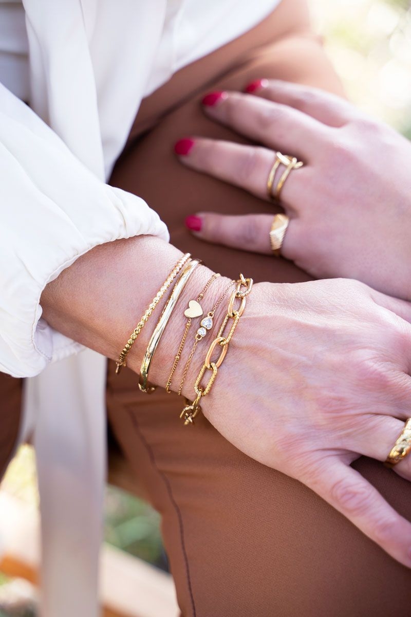 ARMBAND TWEE HARTJES STENEN GOUD