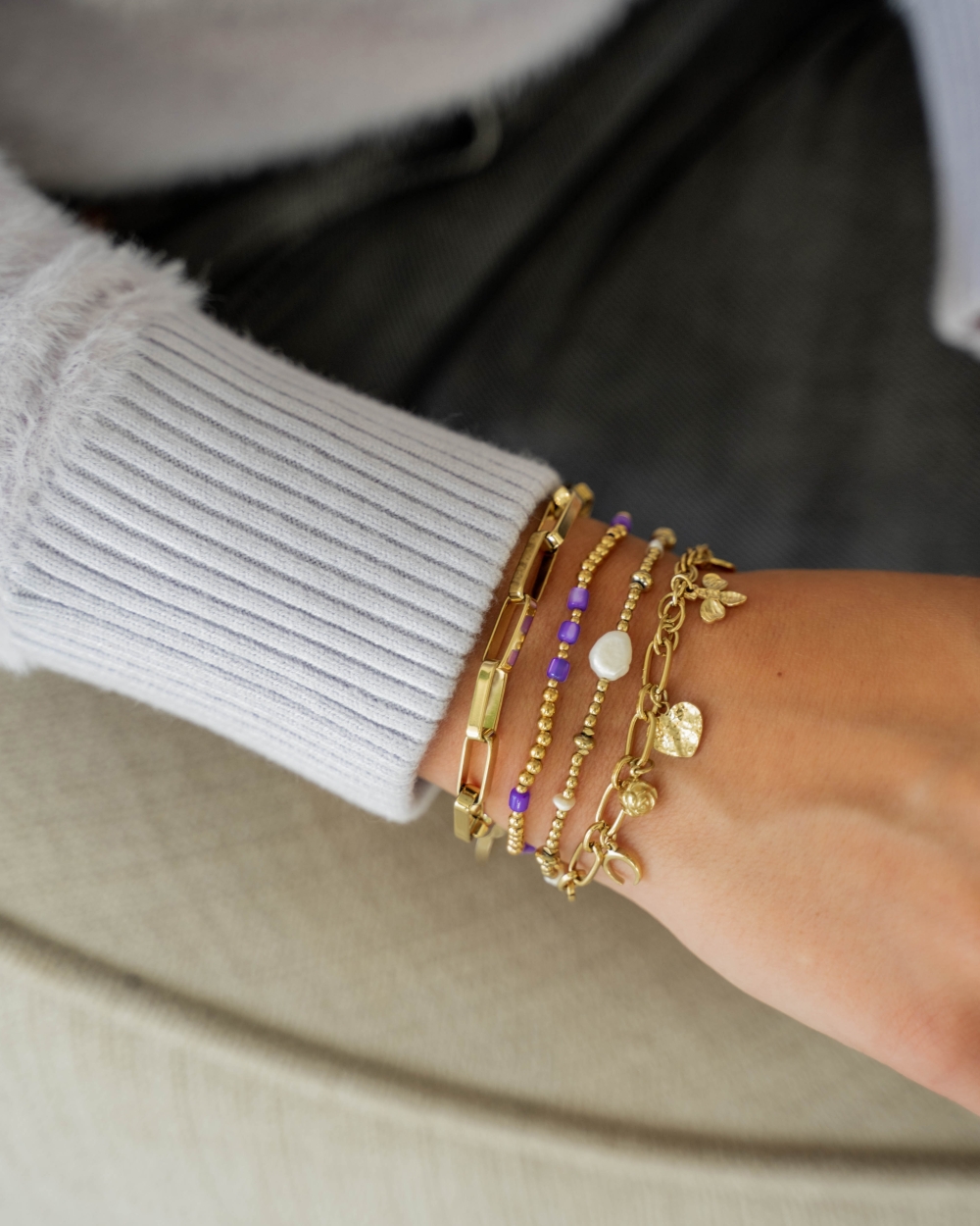 ARMBAND SCHAKEL EN BEDELS
