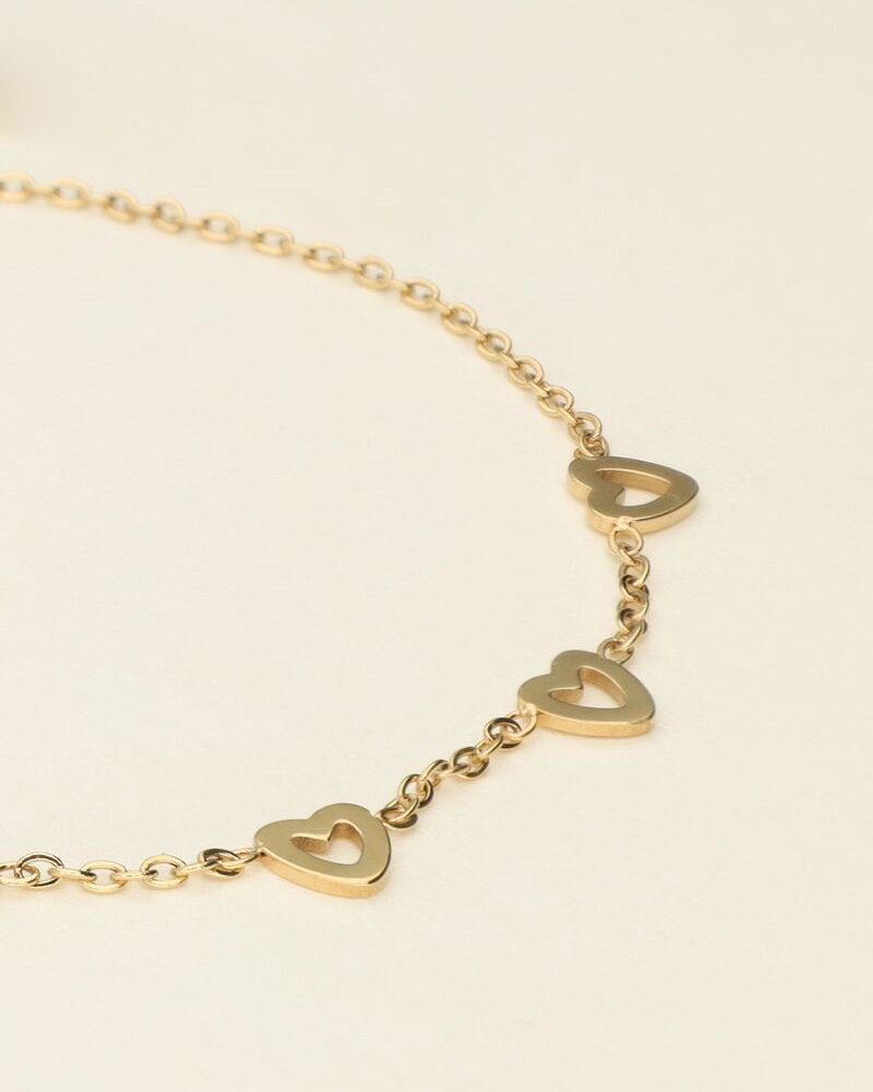 ARMBAND MET KLEINE HARTJES GOUD