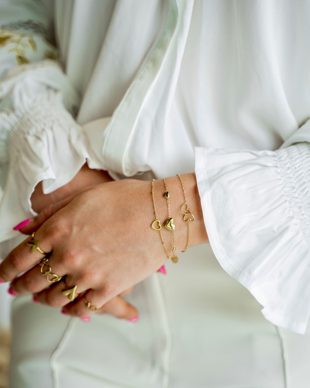 ARMBAND 3 HARTJES GOUD