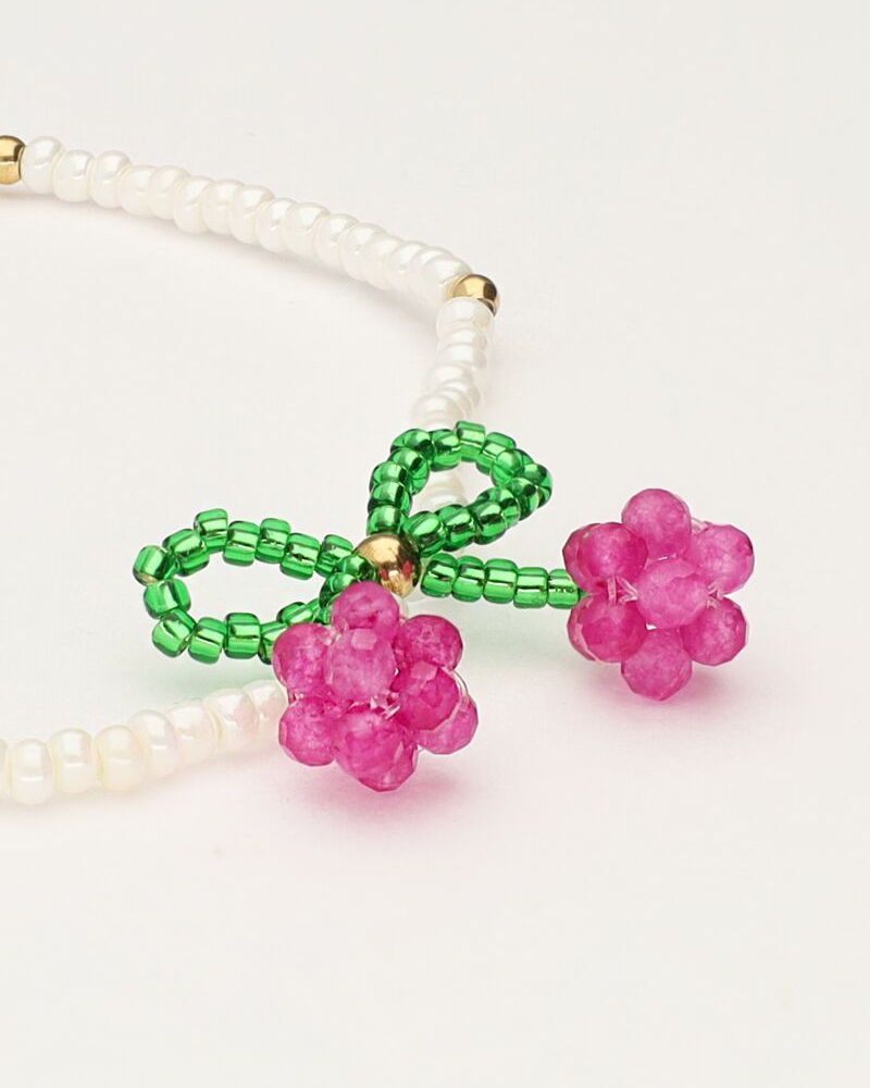 WITTE KRALEN ARMBAND MET KERS GOUD