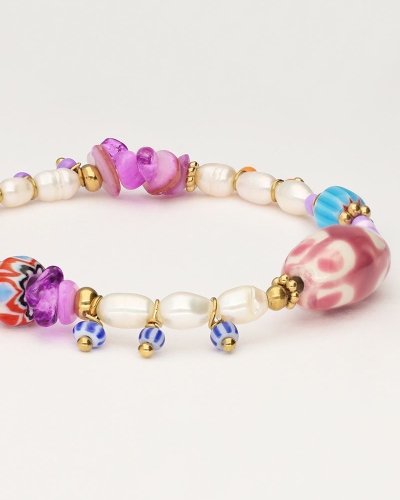 ART PAARSE KRALEN ARMBAND GOUD