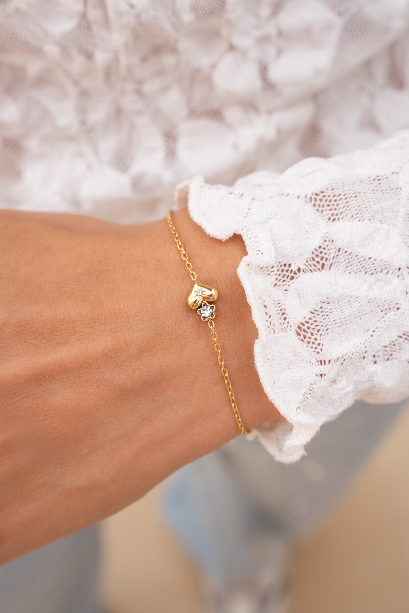 ARMBAND MET HARTJE EN BLOEMETJE GOUD