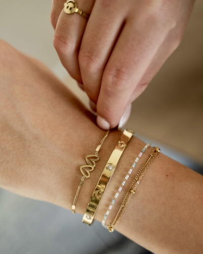 BANGLE MET ZIRKONIA EN KLAVER GOUD
