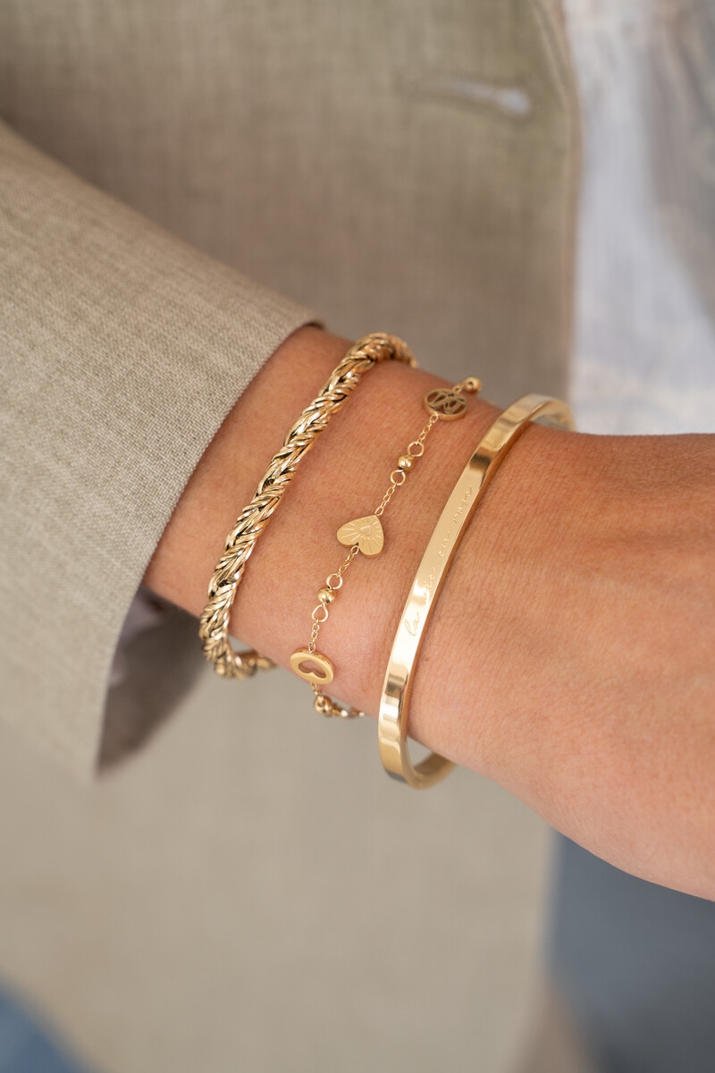 ARMBAND MET HARTJES EN BOLLETJES