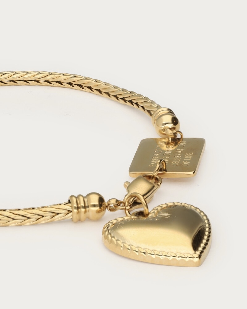 ARMBAND MET HARTVORMIGE BEDEL