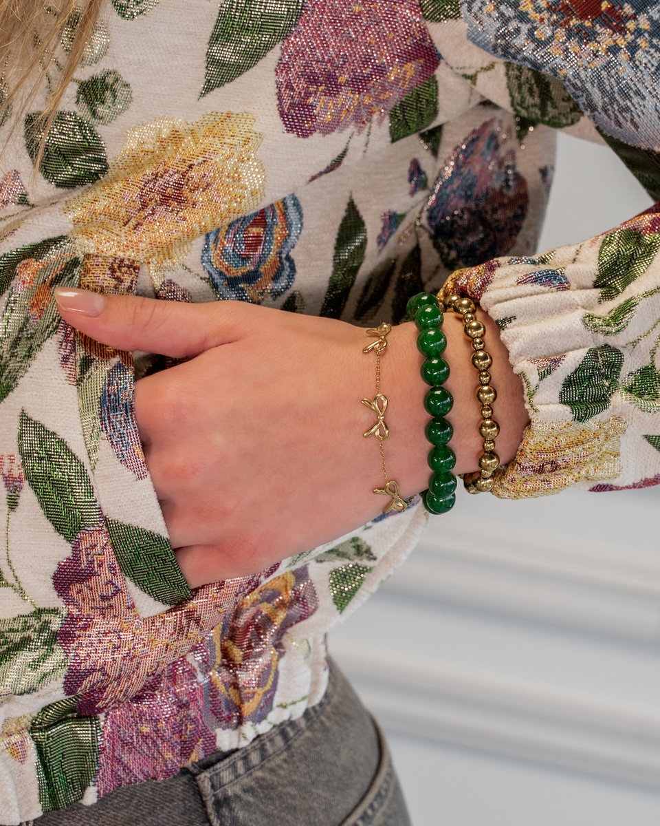 ARMBAND MET 3 STRIKJES GOUD
