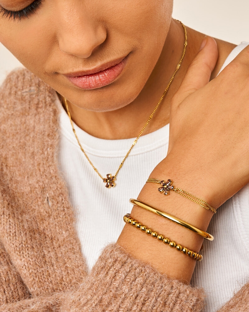 DUBBELE ARMBAND MET BRUINE STRASS BLOEM