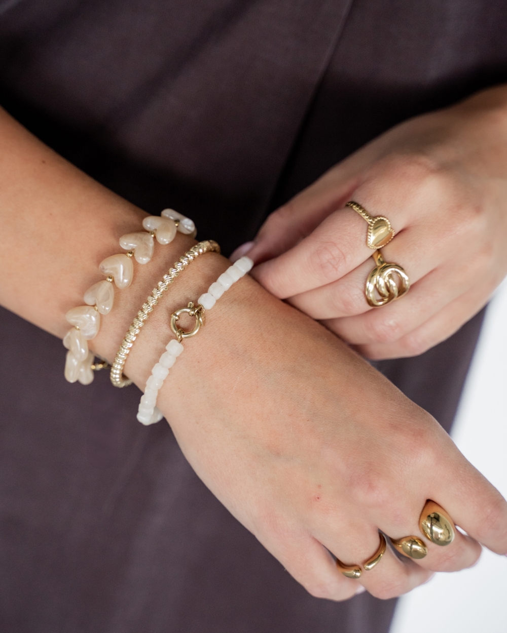 KRALENARMBAND BEIGE