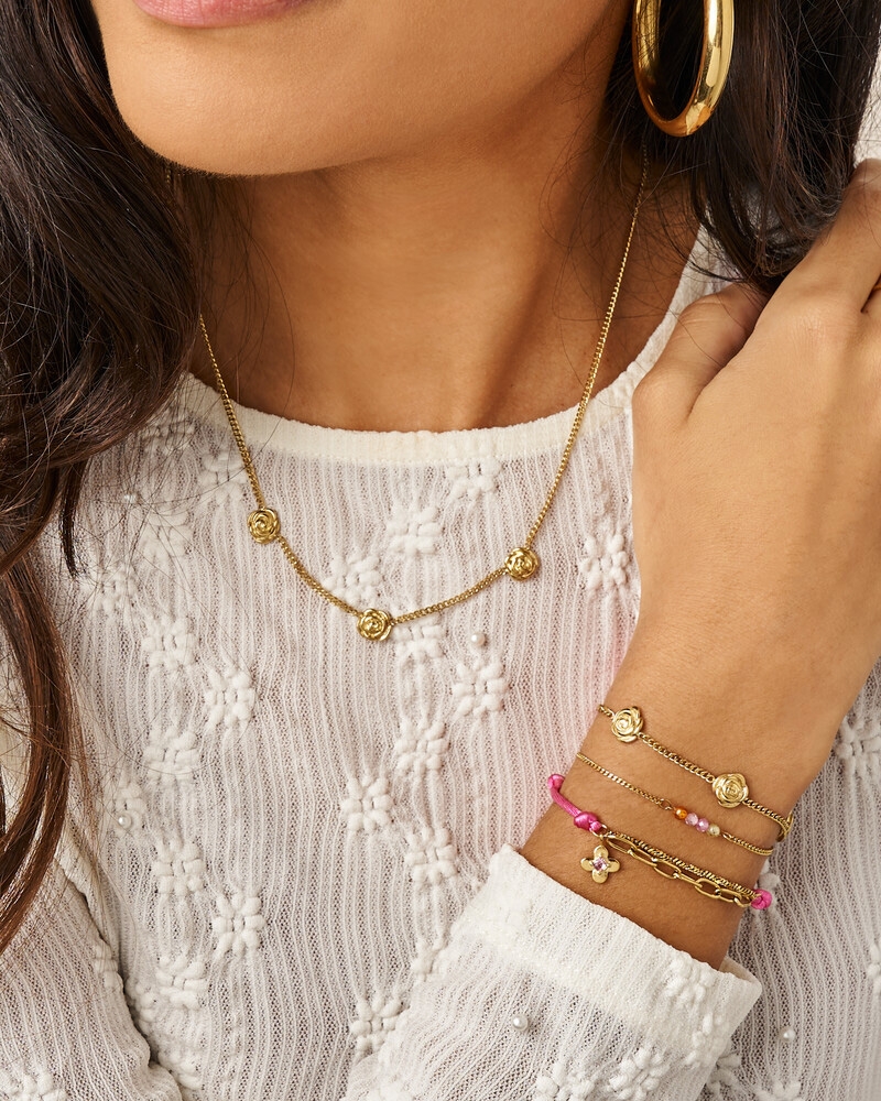 BOTANICAL ARMBAND MET DRIE ROZEN GOUD