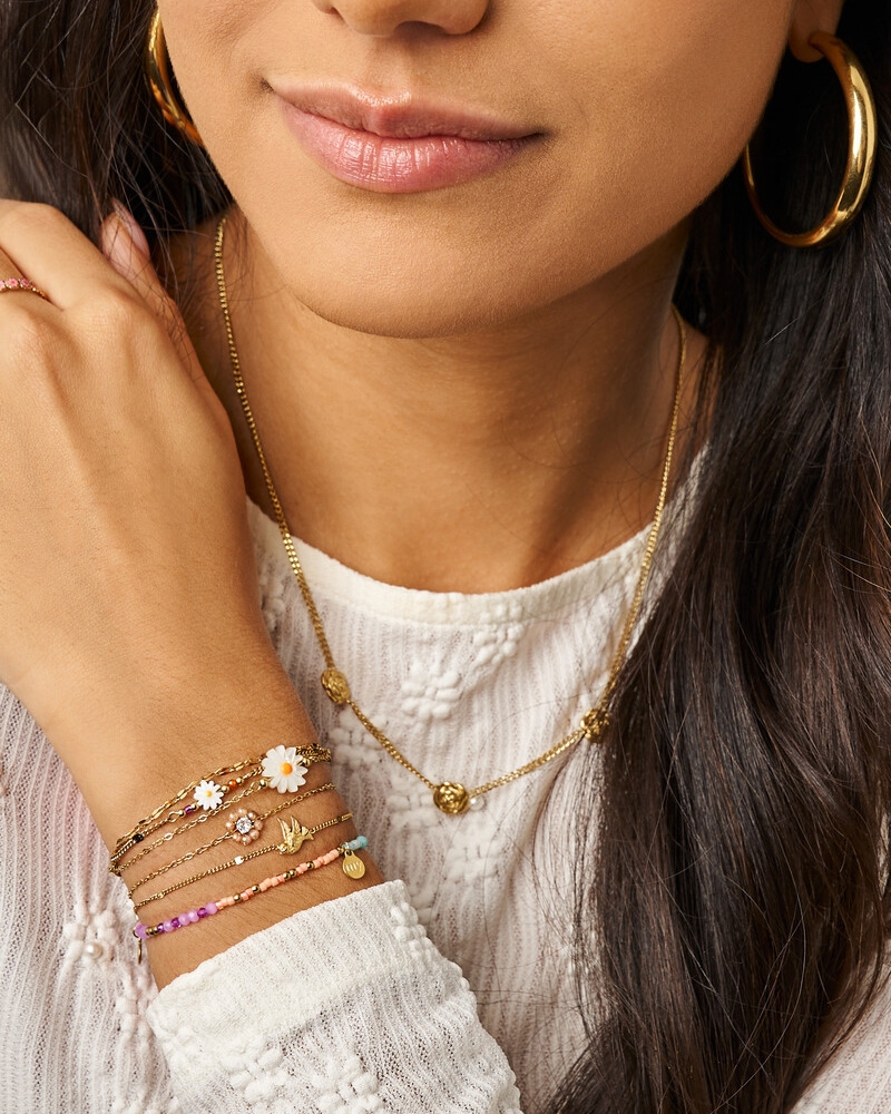 BOTANICAL MINIMALISTISCHE ARMBAND MET VOGEL GOUD