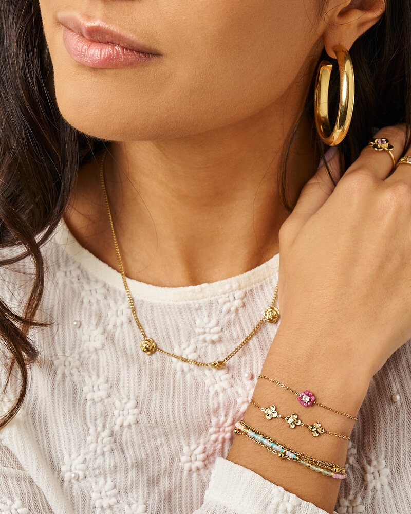 BOTANICAL ARMBAND MET DRIE KLAVER BLOEMEN GOUD