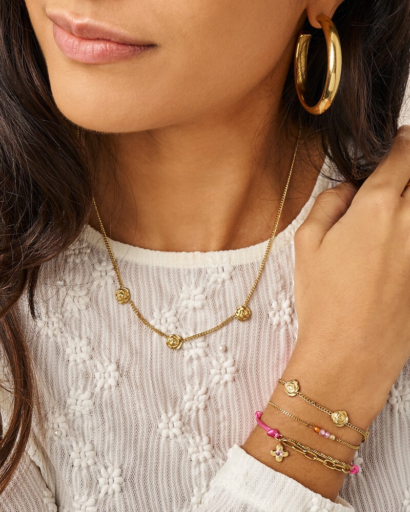 BOTANICAL ARMBAND MET VIER MULTIKLEUR KRALEN GOUD