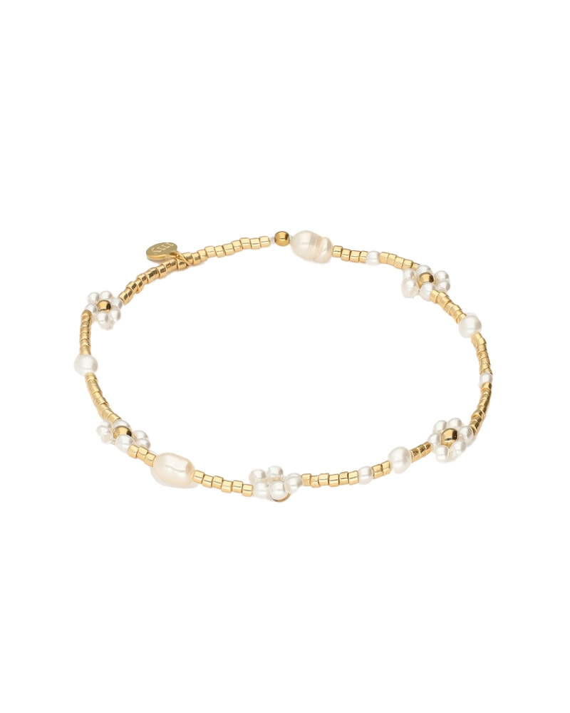 BOTANICAL ELASTIEKEN ARMBAND MET ZOETWATERPAREL BLOEMEN GOUD