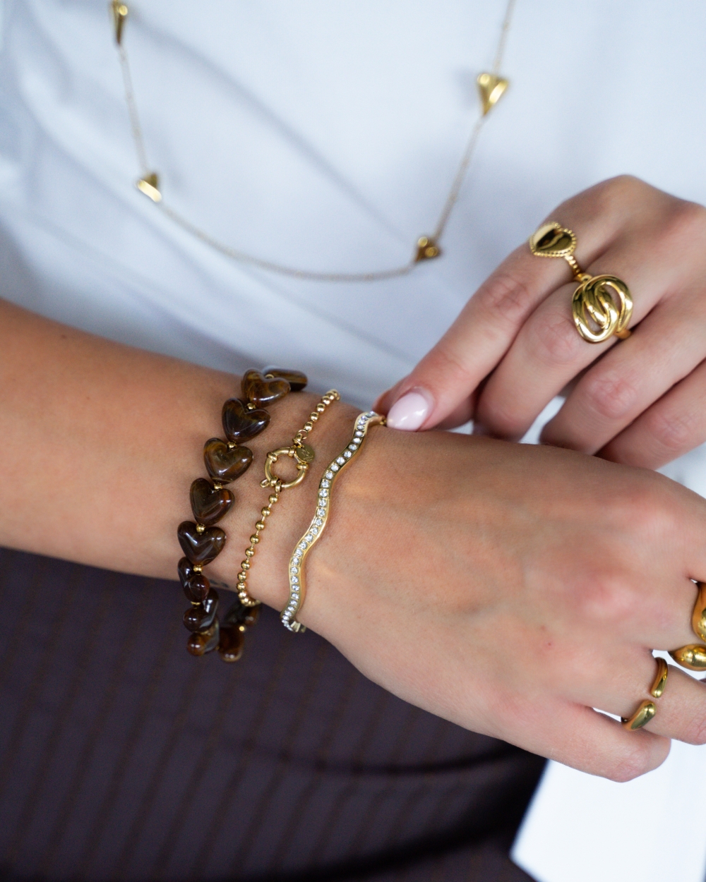 BANGLE WAVE EN STRASS GOUD