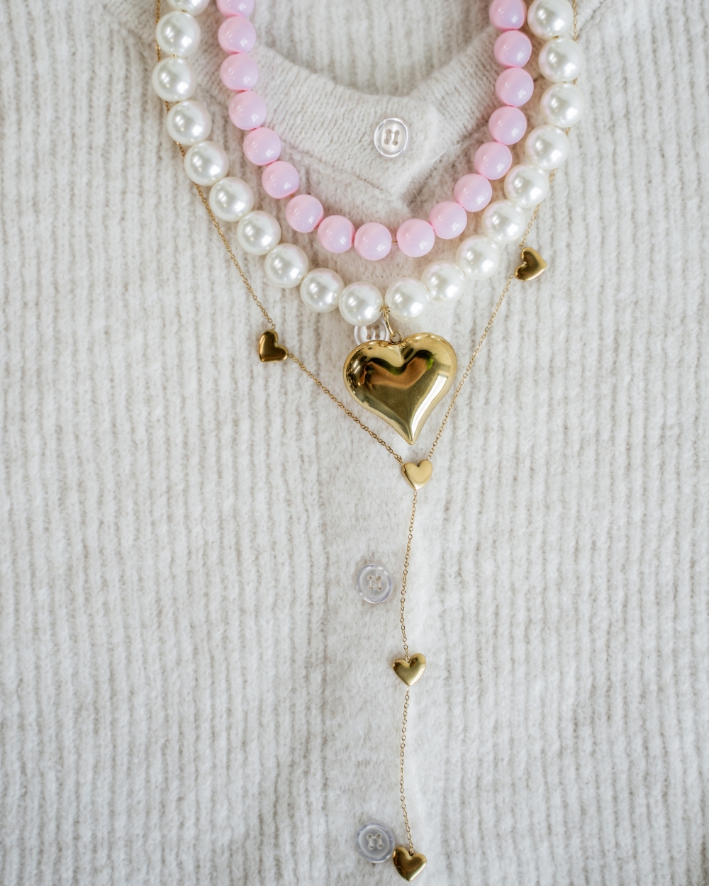 LANGE V-KETTING MET HARTJES GOUD