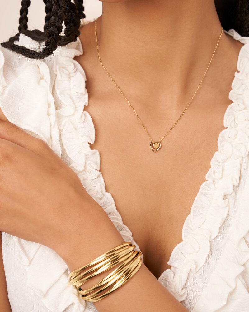 MINIMALISTISCHE KETTING MET DUBBEL HARTJE GOUD