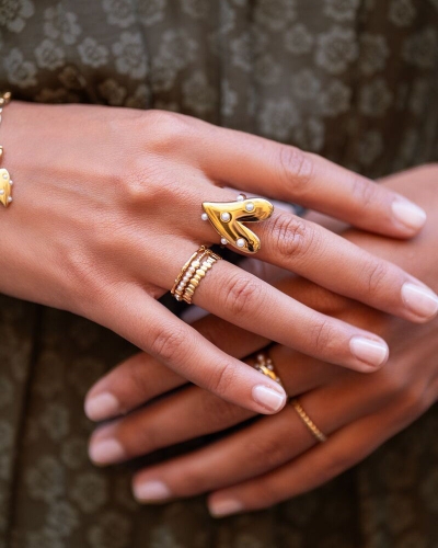 RING MET GROOT HART EN PARELS GOUD