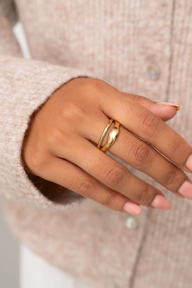 DUBBELE RING MET VORM GOUD