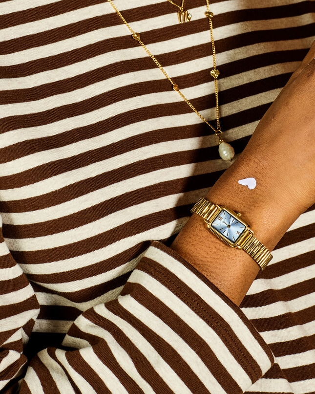VIERKANTE HORLOGE MET LAVENDER WIJZERPLAAT GOUD